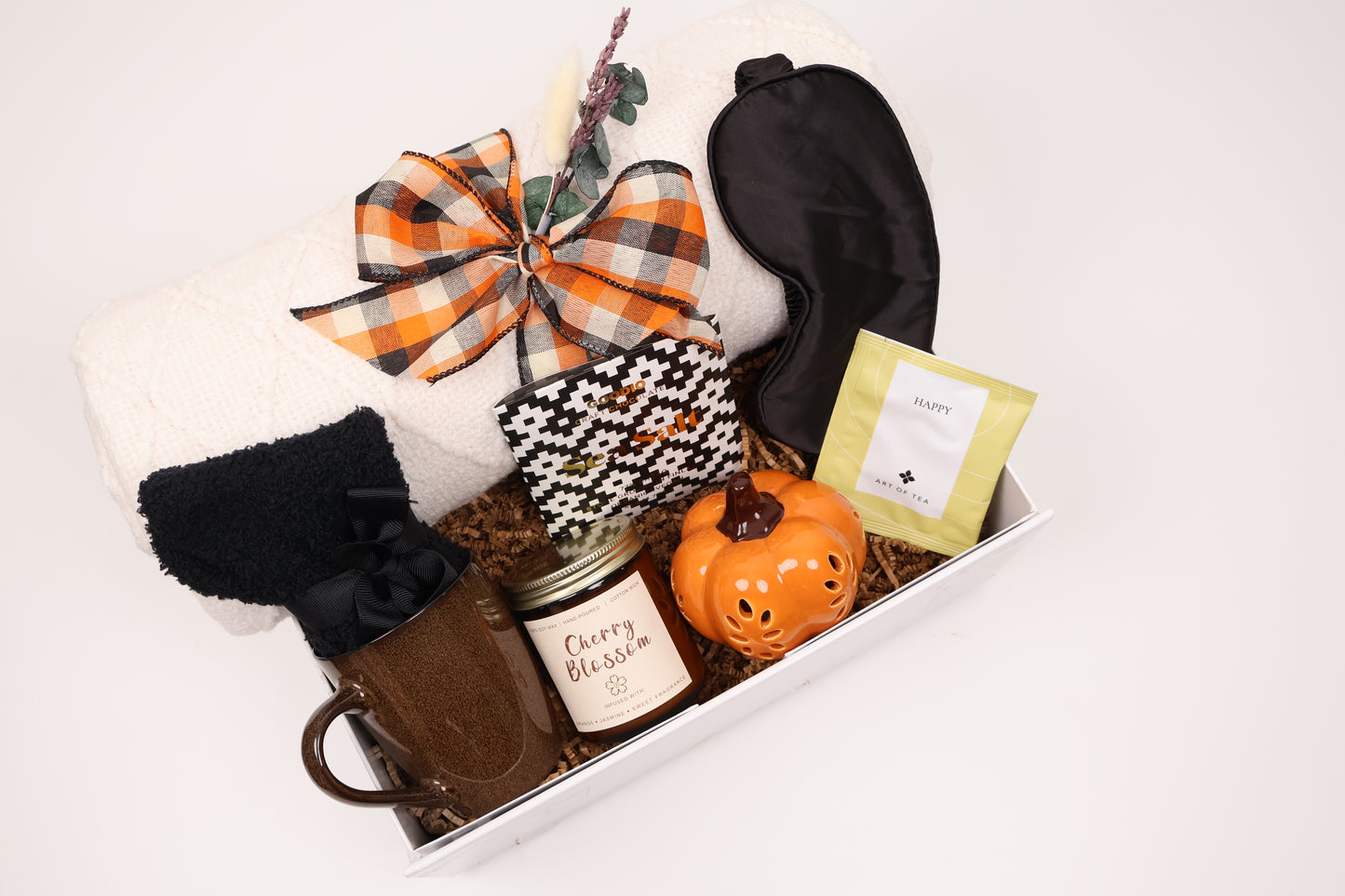 Cozy Fall Gift Box with a Cable-Knit Throw and a Ceramic Pumpkin