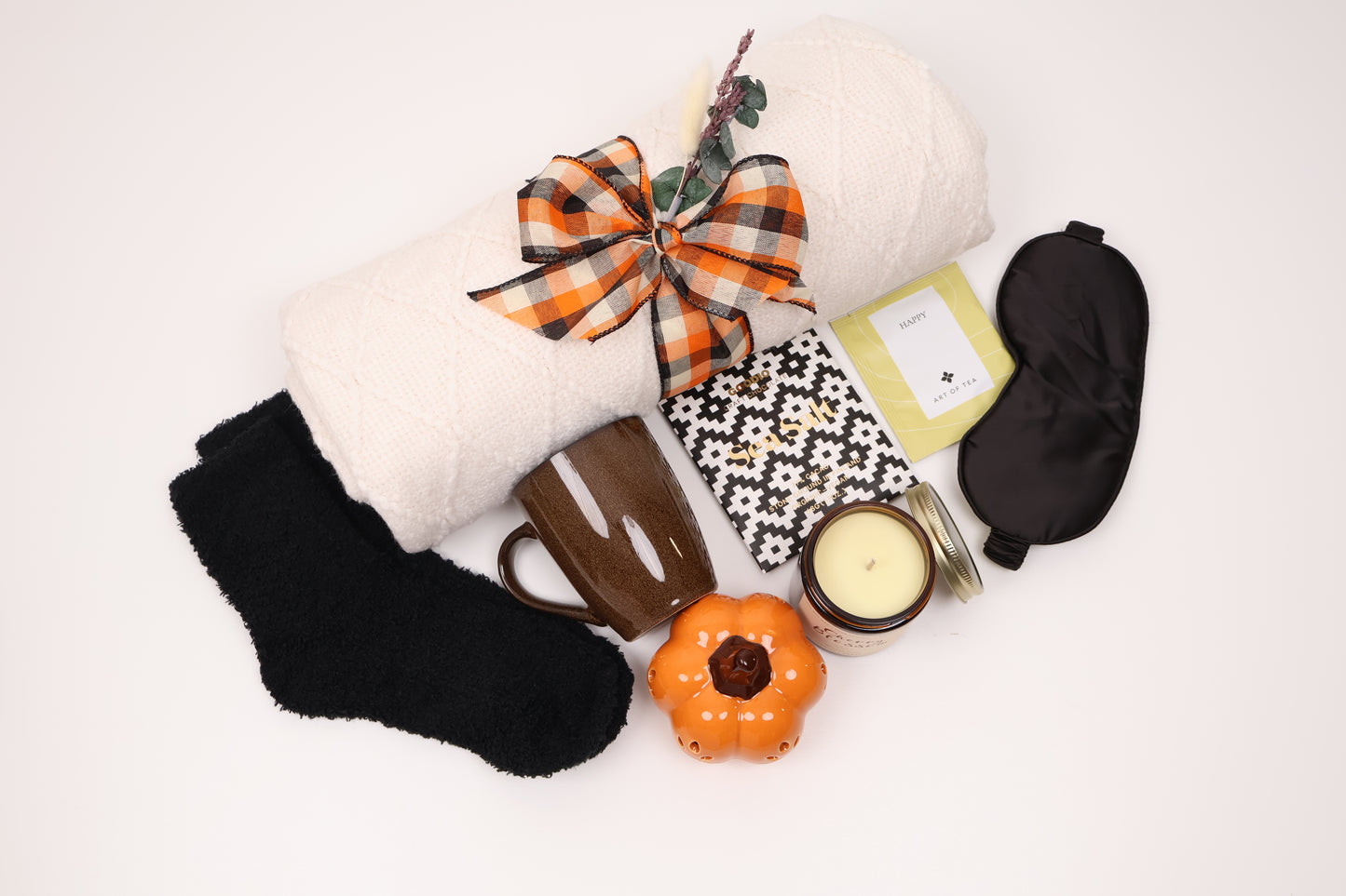 Cozy Fall Gift Box with a Cable-Knit Throw and a Ceramic Pumpkin