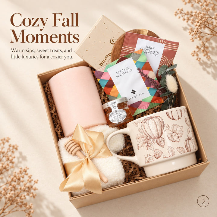 Cozy fall tea gift box with a pumpkin mug, honey and fuzzy socks, styled full box