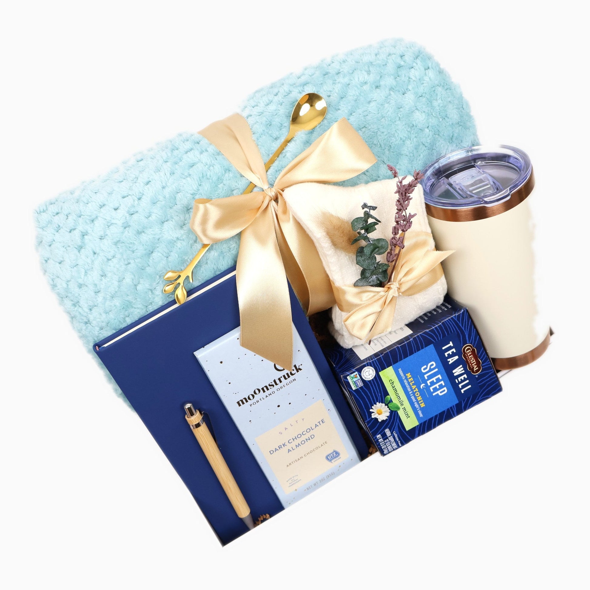 Cozy sleep and relaxation gift box with plush aqua throw, insulated tumbler, sleep tea, journal, and chocolate