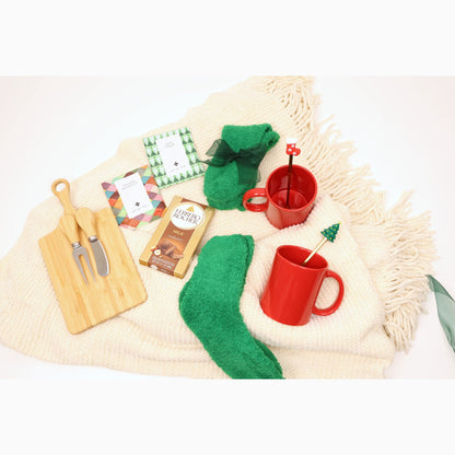 Festive Holiday Gift Box for Two - flat lay on knit throw