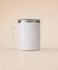 Laser engraving a logo onto a white insulated mug
